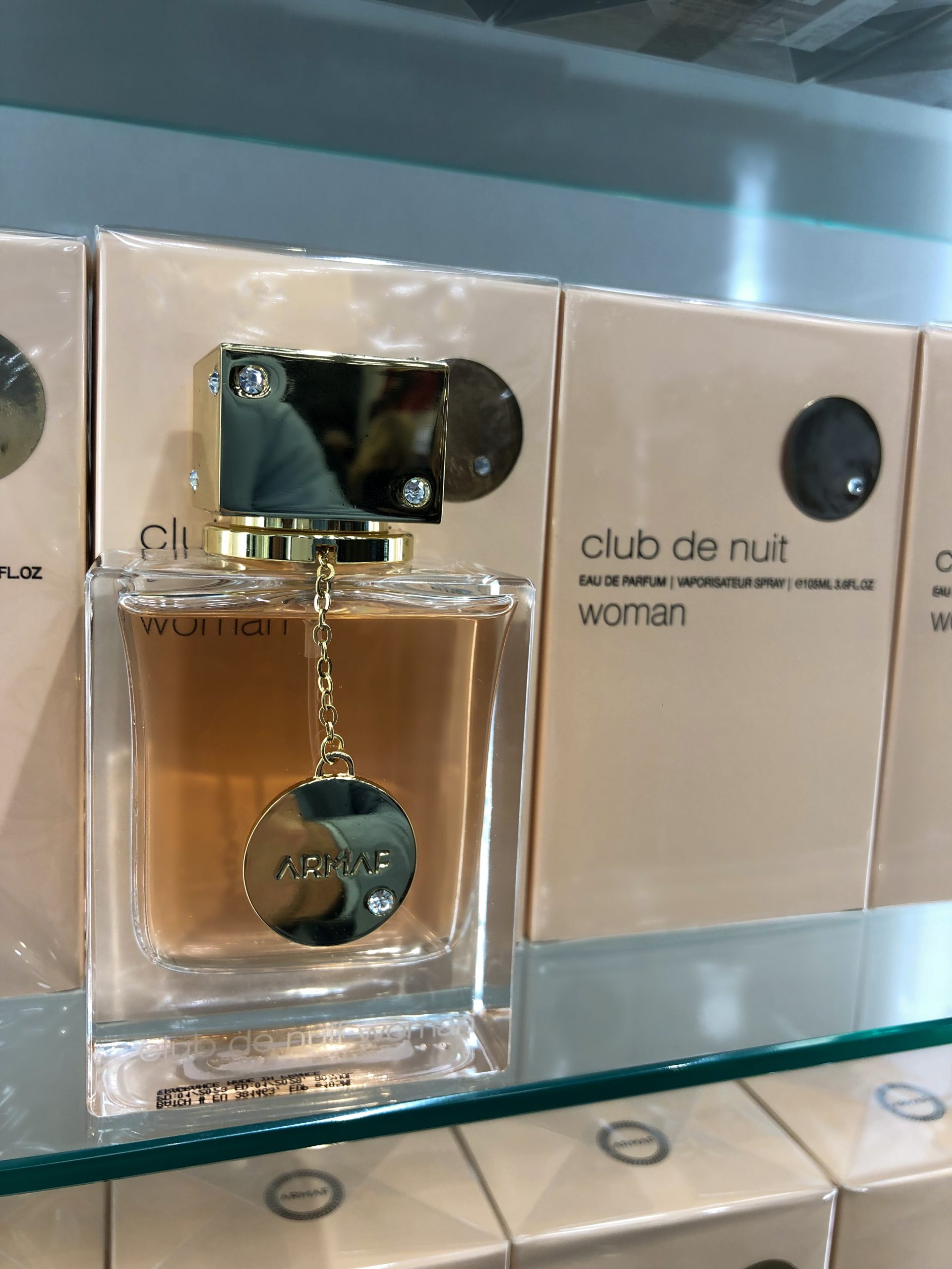 Armaf Club de Nuit Woman a bottle & package